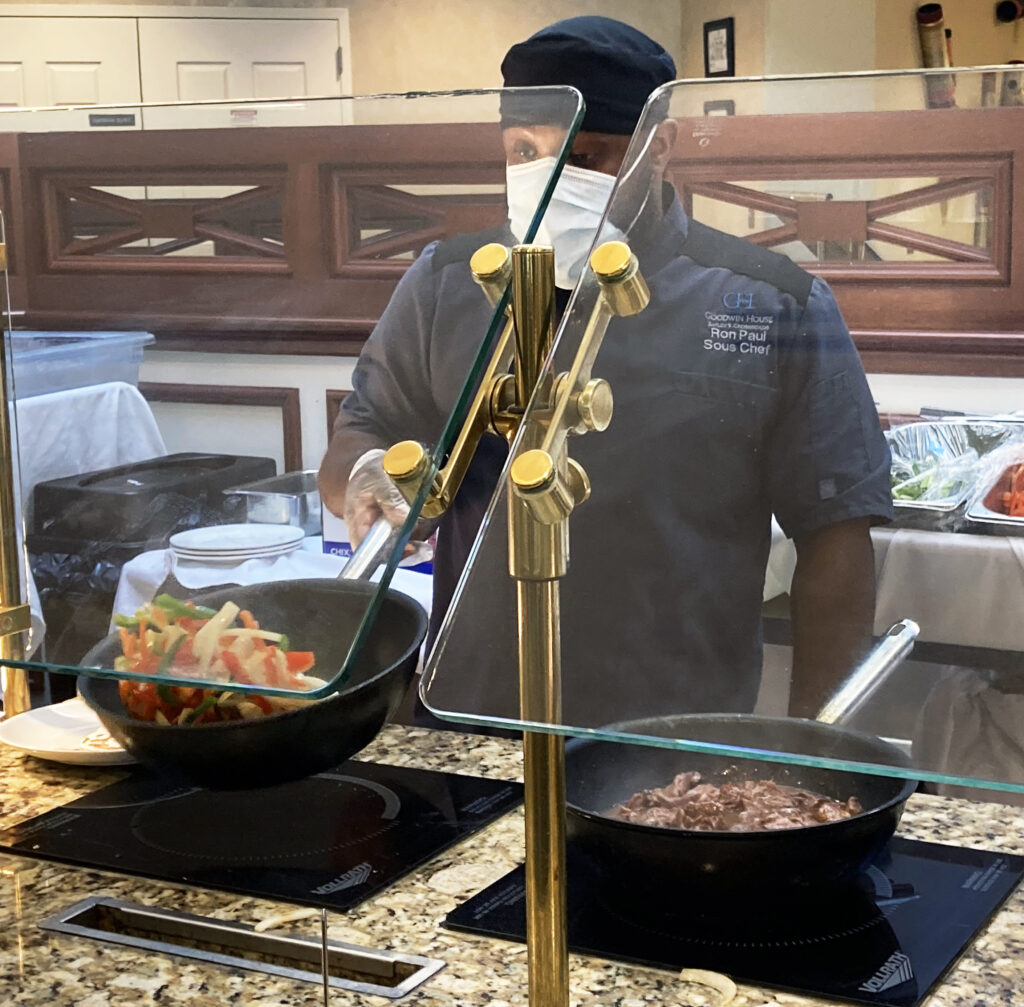 chef cooks Mongolian beef at an action station at GHBC